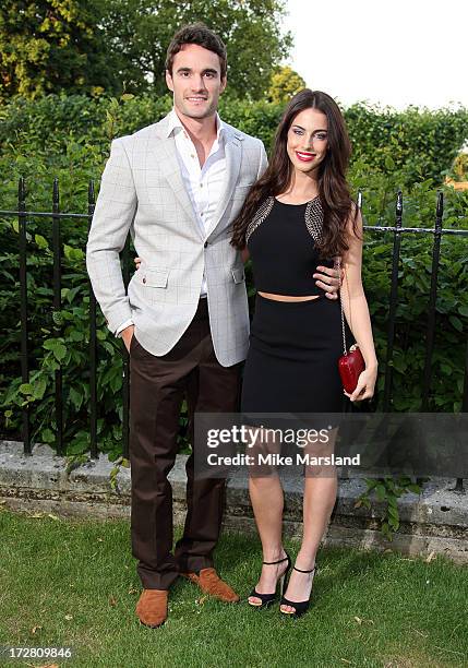Jessica Lowndes and Thom Evans attend the launch party for the Fashion Rules exhibition, a collection of dresses worn by HRH Queen Elizabeth II,...