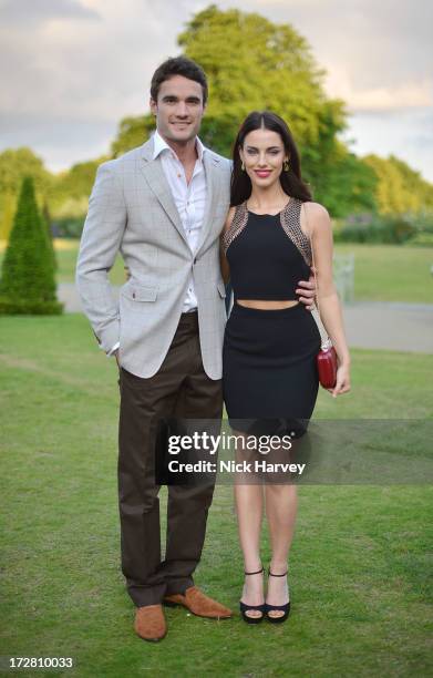 Thom Evans and Jessica Lowndes attend the launch party for the Fashion Rules exhibition, a collection of dresses worn by HRH Queen Elizabeth II,...