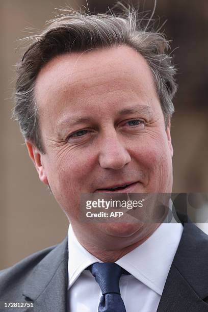 British Prime Minister David Cameron smiles during a visit to Battersea Power Station in central London on July 4, 2013. Battersea Power Station,...