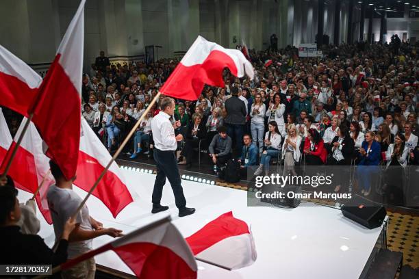 The Leader of Civic Coalition Party, Donald Tusk delivers a speech during the Women for Elections Campaign rally on October 10, 2023 in Lodz, Poland....