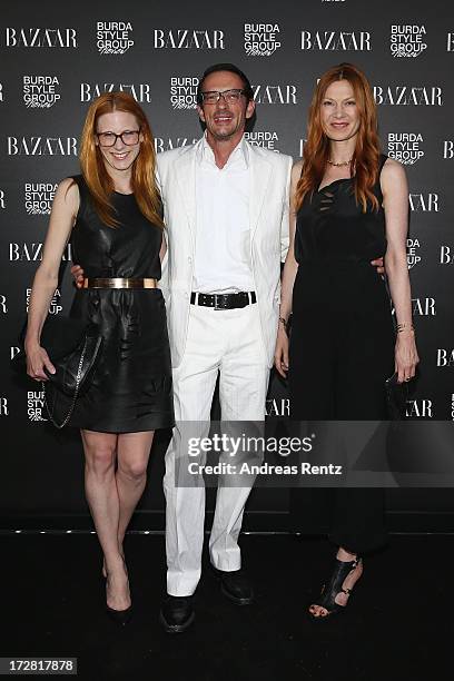 Johanna Kuehl, Oskar Roehler and Alexandra Fischer-Roehler attend the Burda Style Group Preview - Harper's Bazaar pre launch party during the...