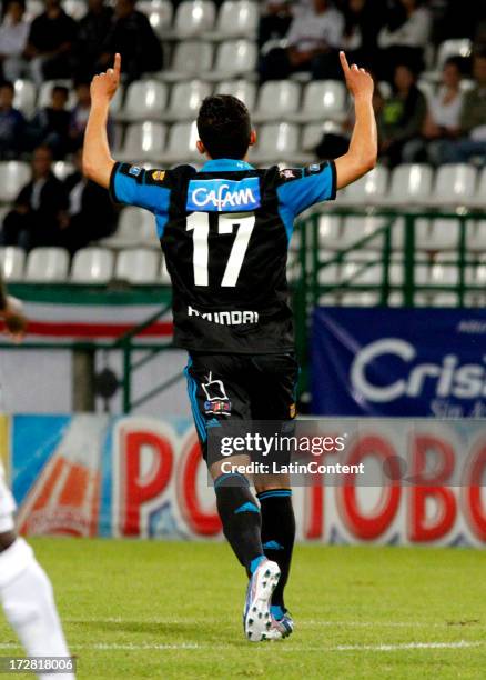 Players of Millonarios celebrate a goal during a game between Once Caldas and Millonarios as part of Liga Postobon 2013 at the Palo Grande stadium on...