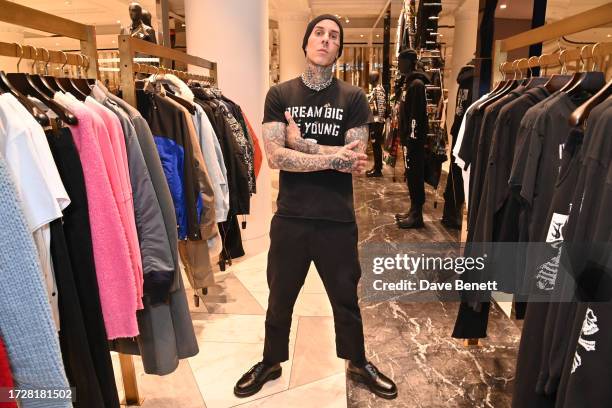 Travis Barker attends the launch of Travis Barker's fashion brand DTA exclusively at Selfridges on October 10, 2023 in London, England.