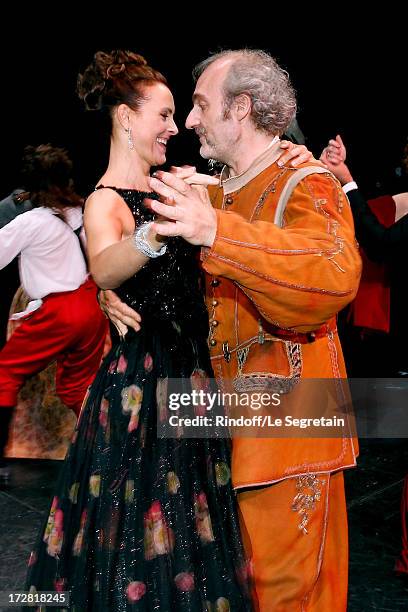 Actors Carole Bouquet and Michel Vuillermoz dancing on stage after a Show written by Muriel Mayette and an auction of stage costumes and accessories...
