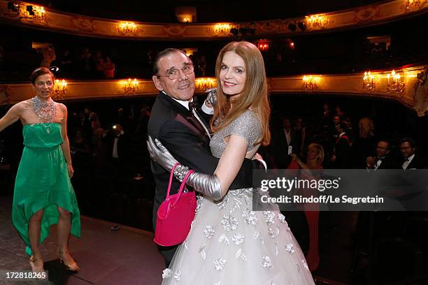 Actress Cyrielle Clair and companion Michel Corbiere dancing on stage after a Show written by Muriel Mayette and an auction of stage costumes and...