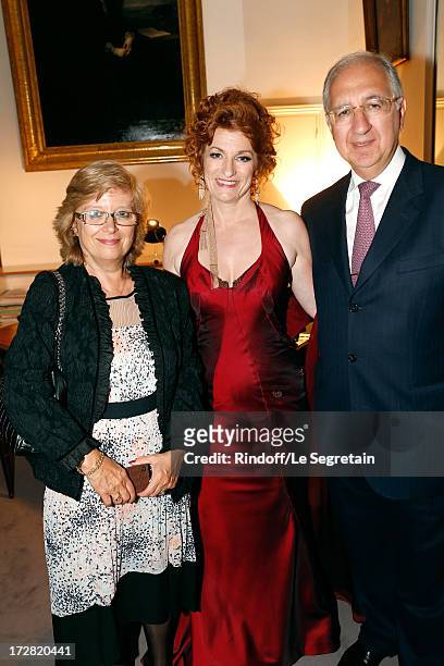 General administrator of Comedie Francaise Muriel Mayette standing between CEO Grant-Thorton Daniel Kurdjian and wife attend Le Grand Bal De La...