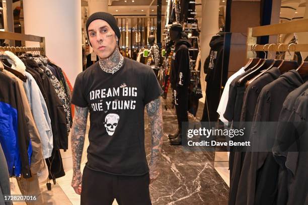 Travis Barker attends the launch of Travis Barker's fashion brand DTA exclusively at Selfridges on October 10, 2023 in London, England.