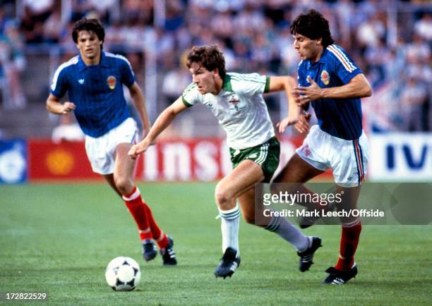 World Cup 1982, Spain, Northern Ireland v Yugoslavia, Norman Whiteside slips through the Yugoslav midfield, Norman was 17 years and 42 days old when...
