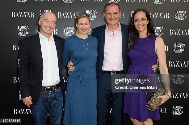 Ulrich Loechner, Julia Fromm, Lueder Fromm and Bettina Haussmann attend Burda Style Group Preview - Harper's Bazaar pre launch party during the...