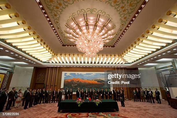 Pakistan and Chinese officials attend a signing ceremony held at the Great Hall of the People on July 5, 2013 in Beijing, China, Friday. This is...