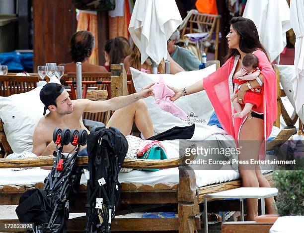 Barcelona football player Cesc Fabregas, his girlfriend Daniella Semaan and their daughter Lia Fabregas are seen on July 4, 2013 in Ibiza, Spain.