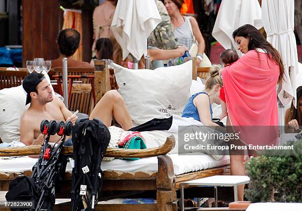 Barcelona football player Cesc Fabregas, his girlfriend Daniella Semaan and their daughter Lia Fabregas are seen on July 4, 2013 in Ibiza, Spain.