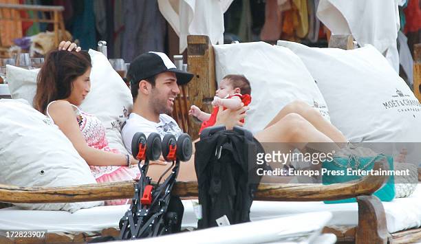 Barcelona football player Cesc Fabregas, his girlfriend Daniella Semaan and their daughter Lia Fabregas are seen on July 4, 2013 in Ibiza, Spain.