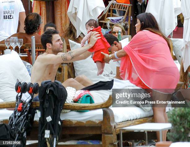 Barcelona football player Cesc Fabregas, his girlfriend Daniella Semaan and their daughter Lia Fabregas are seen on July 4, 2013 in Ibiza, Spain.