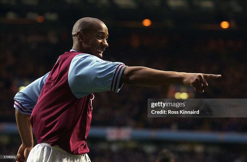 Dion Dublin of Aston Villa celebrates scoring Aston Villa's first goal