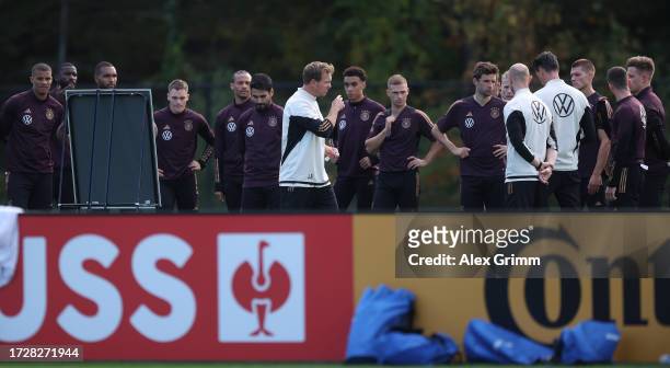 Julian Nagelsmann, head coach of Germany gives directions to his players during a training session of the German national football team on October...