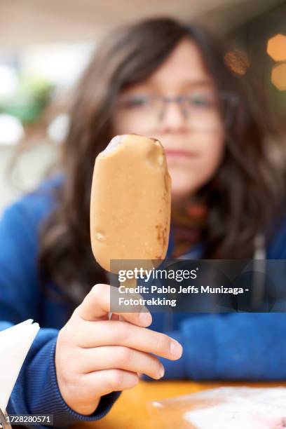 teenage boy with ice cream - viña del mar stock pictures, royalty-free photos & images