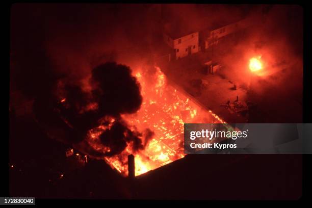 Burning building during the 1992 Los Angeles Riots. The rioting followed the acquittal of the police officers who had been videotaped beating Rodney...