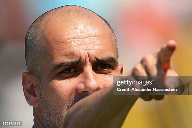 Josep Guardiola, head coach of FC Bayern Muenchen reacts during a training session at Campo Sportivo on July 5, 2013 in Arco, Italy.