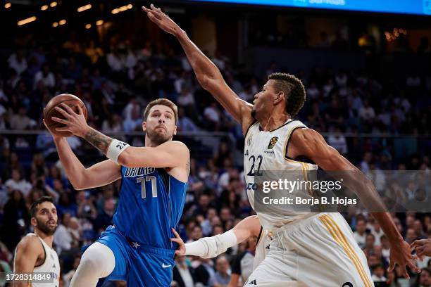 Edy Tavares of Real Madrid and Luka Doncic of Dallas Mavericks during Exhibition match between Real Madrid and Dallas Mavericks at WiZink Center on...