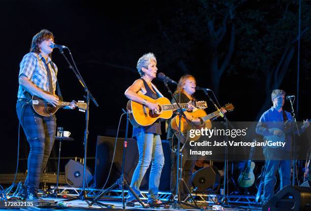 American folk singer Joan Baez performs with the Indigo Girls at Central Park SummerStage, New York, New York, June 17, 2013. Pictured are, from...