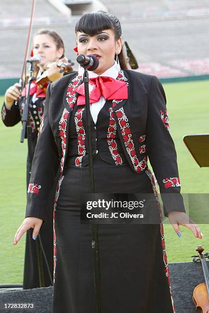 Member of the musical group Mariachi Divas performs on stage during Americafest 2013, 87th Annual Fourth of July Celebration at Rose Bowl on July 4,...