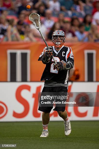 Brendan Mundorf of the Denver Outlaws in action against the New York Lizards at Sports Authority Field at Mile High on July 4, 2013 in Denver,...
