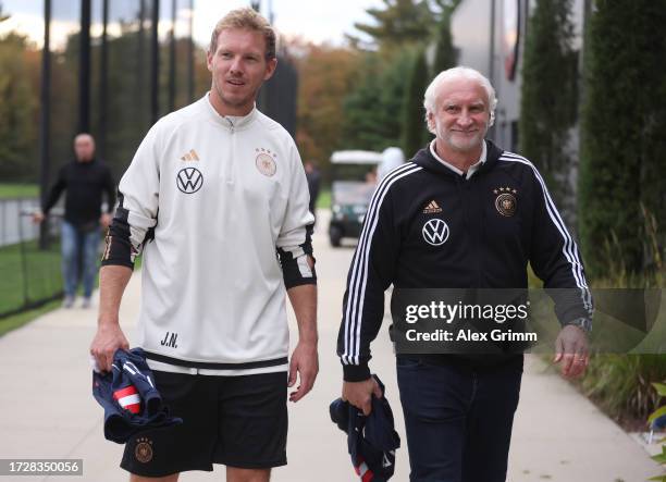 Julian Nagelsmann, head coach of Germany and Rudi Voller director of sport of Germany walk together during a training session of the German national...