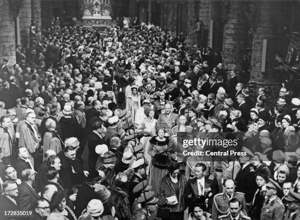 Guests leave the wedding ceremony for King Baudouin of Belgium and Queen Fabiola of Belgium at the Cathedral of St. Michael and St. Gudula, Brussels,...