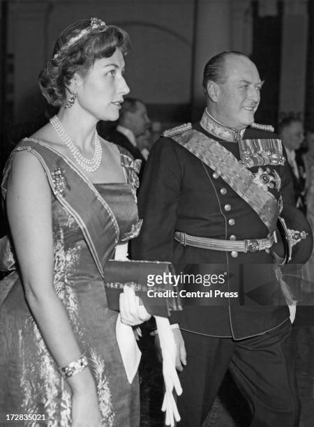 King Olav V of Norway and his daughter Princess Astrid of Norway attend a banquet given by the Belgian government at the Royal Palace of Brussels,...