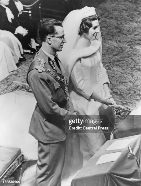 King Baudouin of Belgium and Queen Fabiola of Belgium during their wedding ceremony at the Cathedral of St. Michael and St. Gudula, Brussels, 15th...