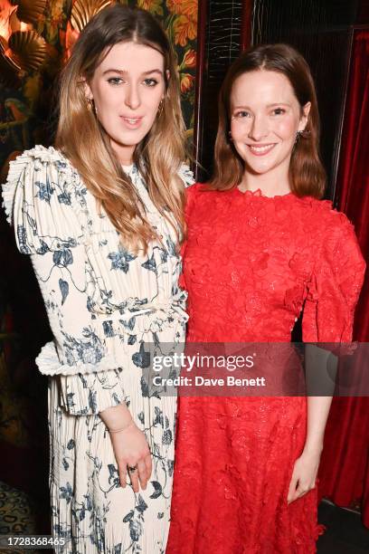 Honor Swinton Byrne and Morfydd Clark attend the Harper's Bazaar Art Party, supported by Jaguar, on October 10, 2023 in London, England.