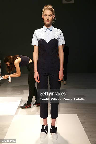 Model poses at the Asli Filinta Show during Mercedes-Benz Fashion Week Spring/Summer 2014 at Brandenburg Gate on July 5, 2013 in Berlin, Germany.