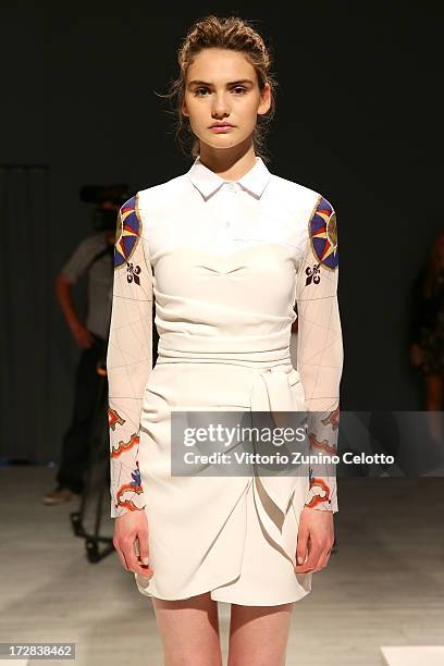 Model poses at the Asli Filinta Show during Mercedes-Benz Fashion Week Spring/Summer 2014 at Brandenburg Gate on July 5, 2013 in Berlin, Germany.