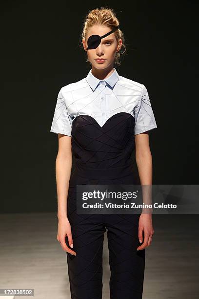 Model poses at the Asli Filinta Show during Mercedes-Benz Fashion Week Spring/Summer 2014 at Brandenburg Gate on July 5, 2013 in Berlin, Germany.