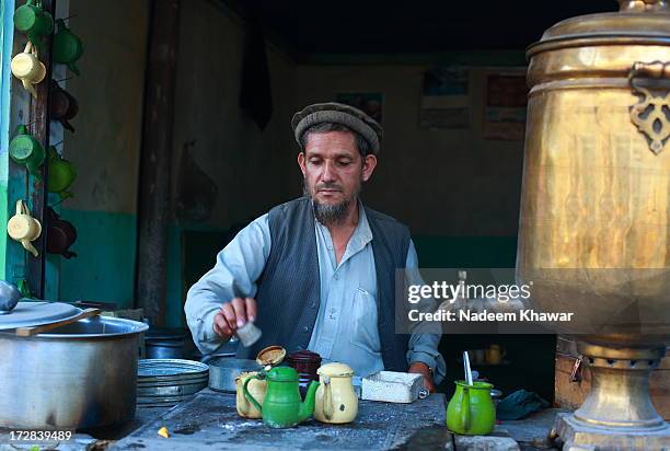 tea shop at chitral, pakistab. - chitral - fotografias e filmes do acervo