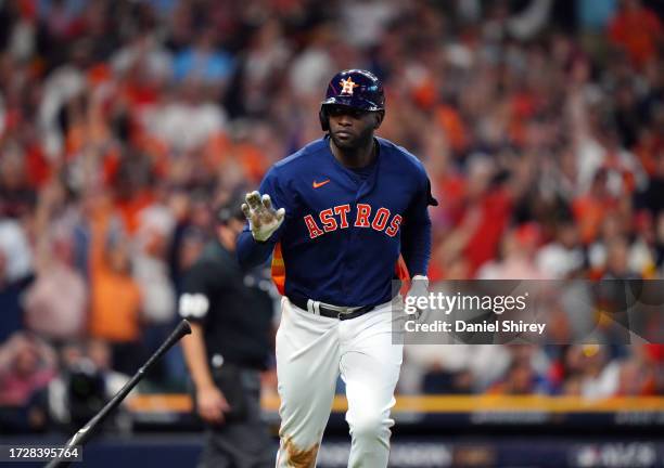 Yordan Alvarez of the Houston Astros rounds the bases after hitting a home run in the eighth inning of Game 2 of the ALCS between the Texas Rangers...