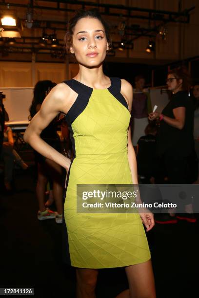 Model backstage ahead of the Asli Filinta Show during Mercedes-Benz Fashion Week Spring/Summer 2014 at Brandenburg Gate on July 5, 2013 in Berlin,...