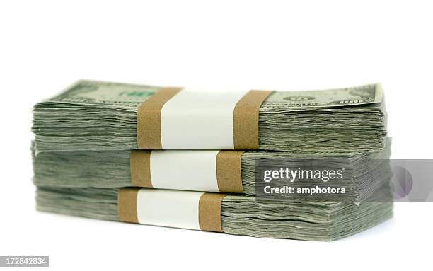 a stack of money and three straps - american one hundred dollar bill stockfoto's en -beelden