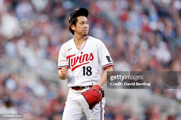 Kenta Maeda of the Minnesota Twins walks off the field in the seventh inning against the Houston Astros during Game Three of the Division Series at...