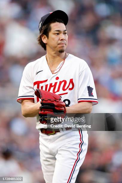 Kenta Maeda of the Minnesota Twins walks off the field in the seventh inning against the Houston Astros during Game Three of the Division Series at...