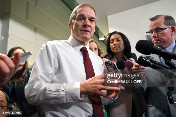 Representative Jim Jordan , R-OH, speaks to the press as he leaves after a Republican party caucus meeting at the US Capitol in Washington, DC, on...