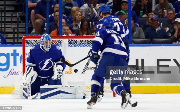 Jonas Johansson of the Tampa Bay Lightning makes a save during the opening night game against the Nashville Predators at Amalie Arena on October 10,...