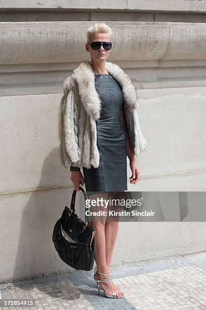 Model Anna Freemantle wears Jacob Birge dress, Jimmy Choo shoes, Bexrox Jewellery, Vintage bag, jacket and sunglasses on day 2 of Paris Collections:...