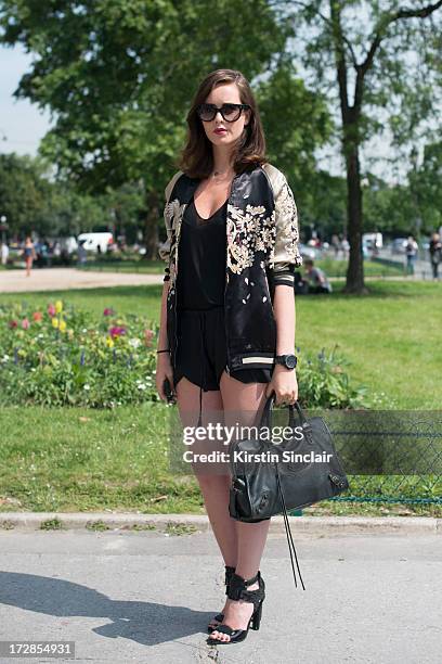 Fashion Blogger Rose Fondorsen wears a Balenciaga bag, Prada sunglasses, Zara top and jacket and Alexander Wang shoes on day 2 of Paris Collections:...