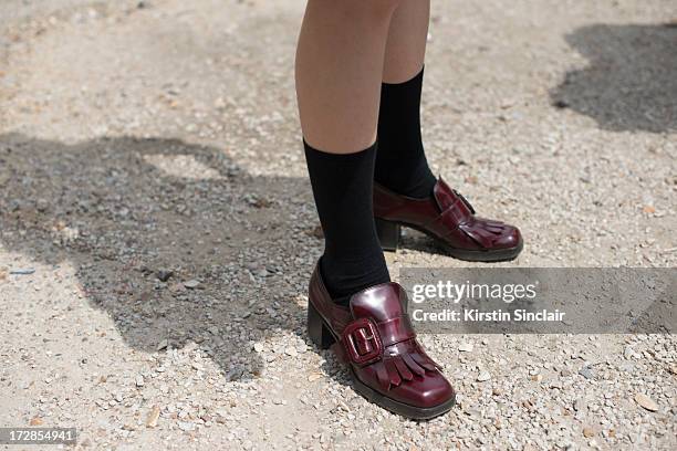 Model Ming Xi wears Miu Miu shoes on day 2 of Paris Collections: Womens Haute Couture on July 02, 2013 in Paris, France.