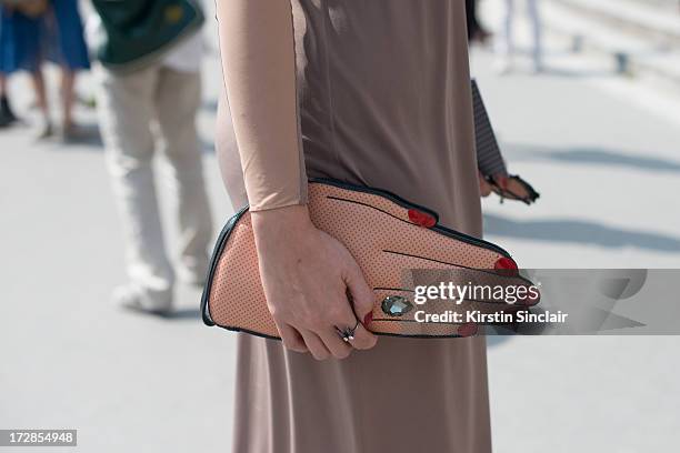 Editor and Chief of Harpers Bazaar Thailand Duang Poshyanonda wears a Rouge Rouge bag and a Vichteerut dress on day 2 of Paris Collections: Womens...