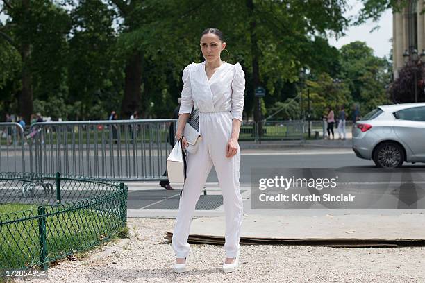 Editor in Chief of Reality Show Magazine Tiffany Godoy wears Vintage jumpsuit and bag and H and M shoes on day 2 of Paris Collections: Womens Haute...
