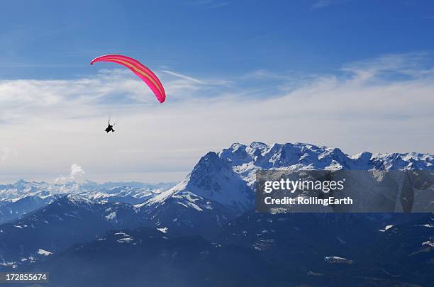 paraglider in the alps - paragliding stock pictures, royalty-free photos & images