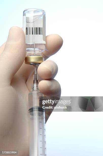 syringe and vial - anabolic steroids stock pictures, royalty-free photos & images